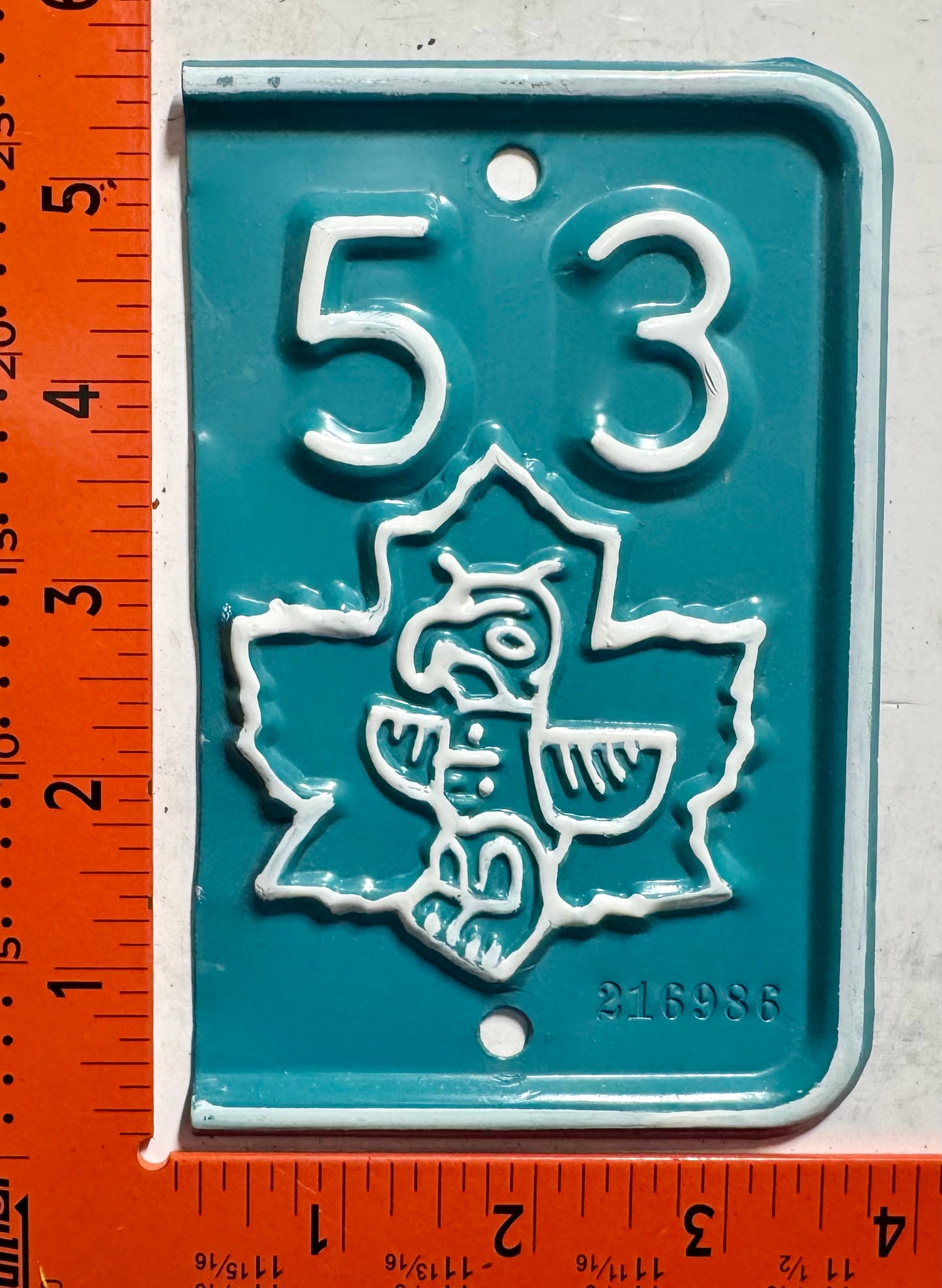 1953 British Columbia #216986 Passenger License Plate Renewal Tab (Repaint)