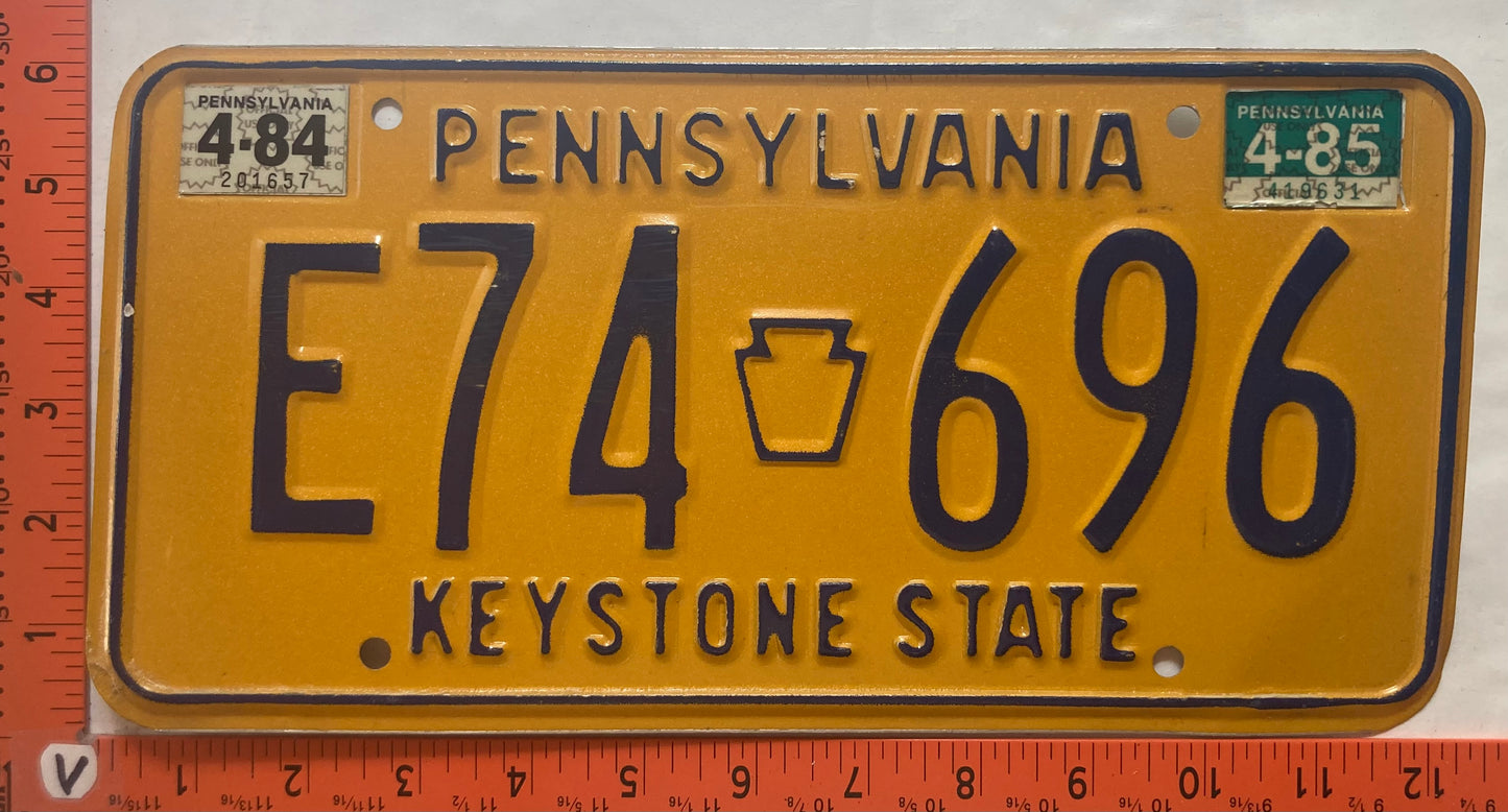 1985 Pennsylvania #E74 696 Passenger License Plate