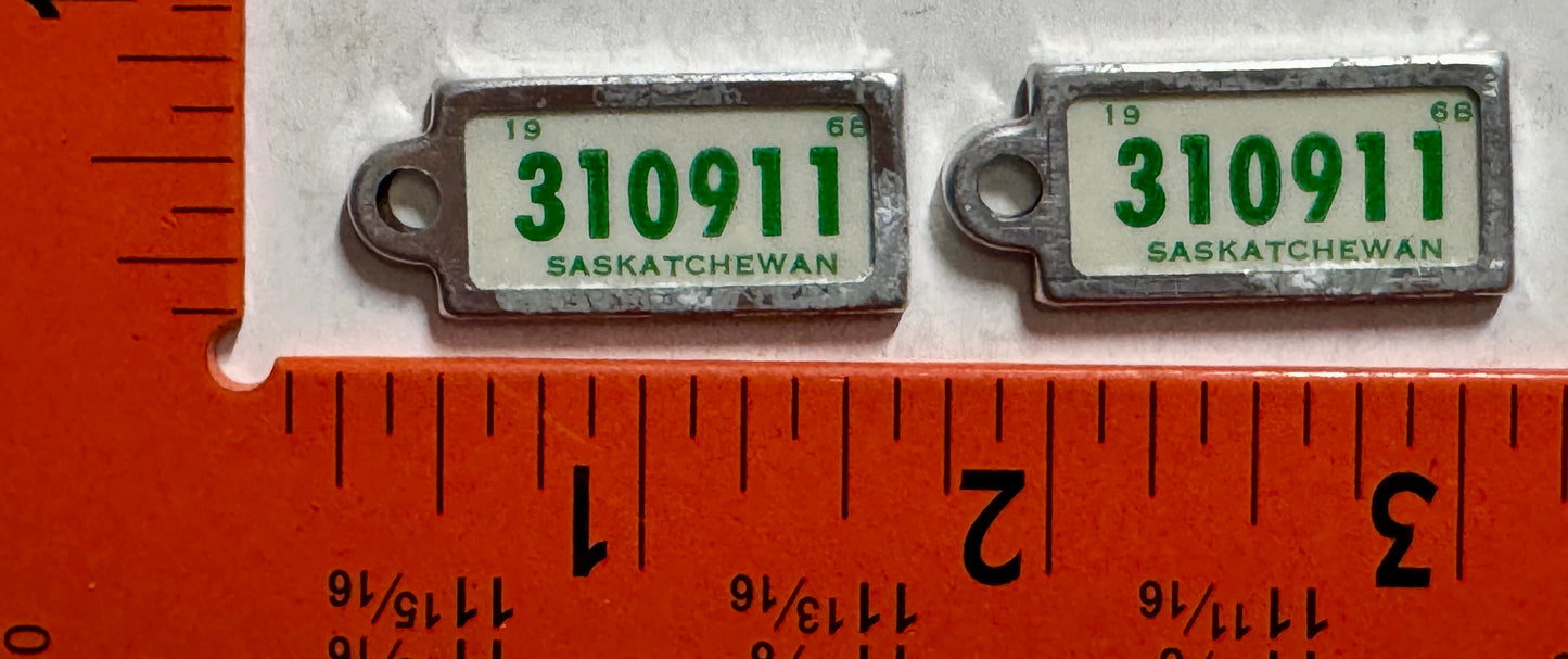 1968 Saskatchewan #310-911 Passenger License Plate Pair w/keychain tags
