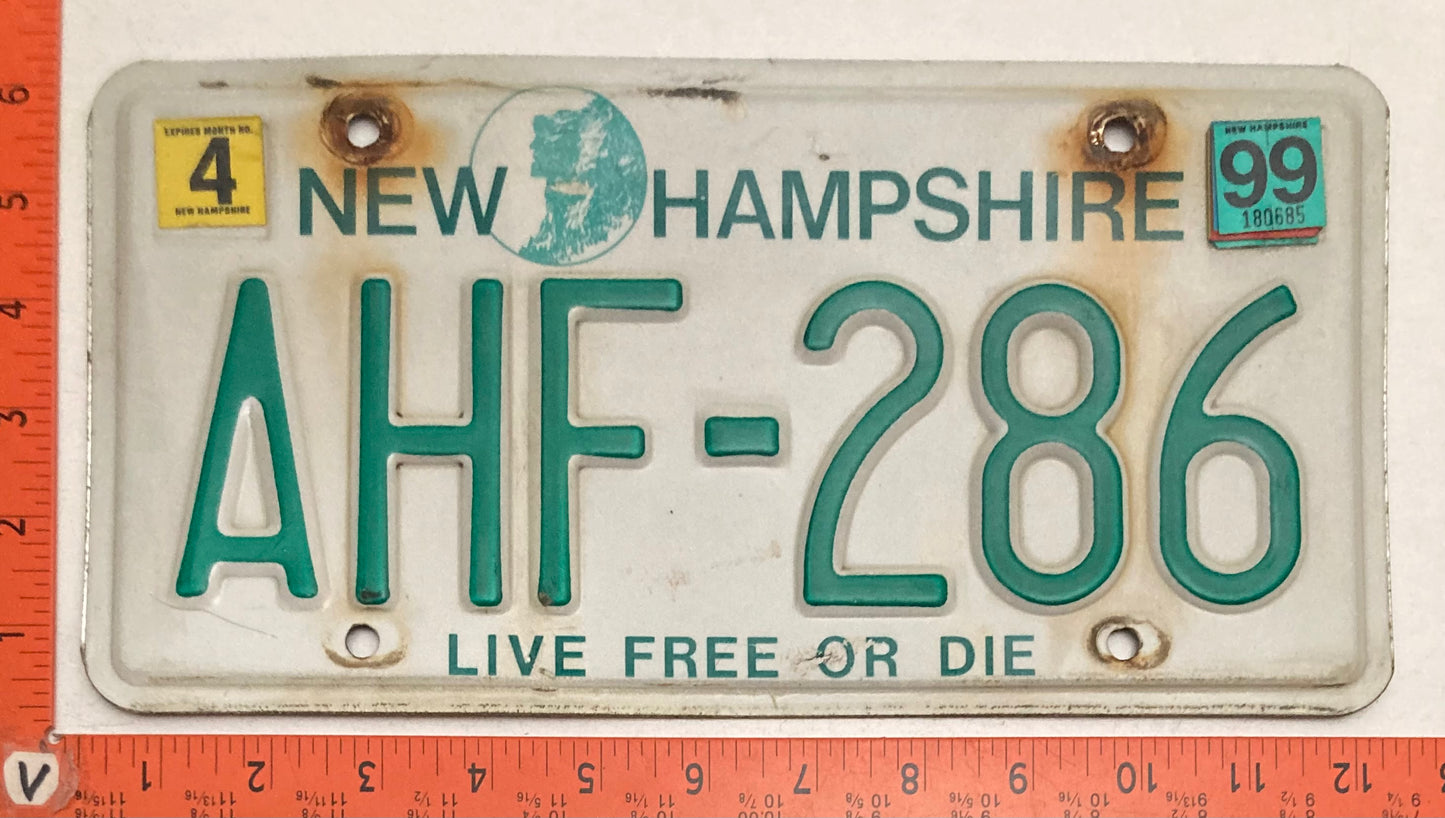 1999 New Hampshire #AHF-286 Passenger License Plate