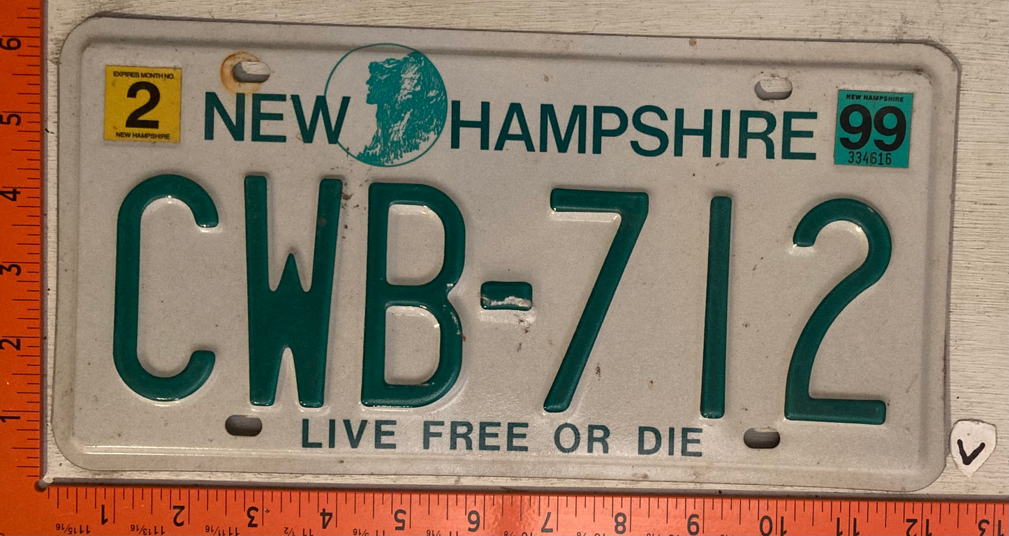 1999 New Hampshire #CWB-712 Passenger License Plate