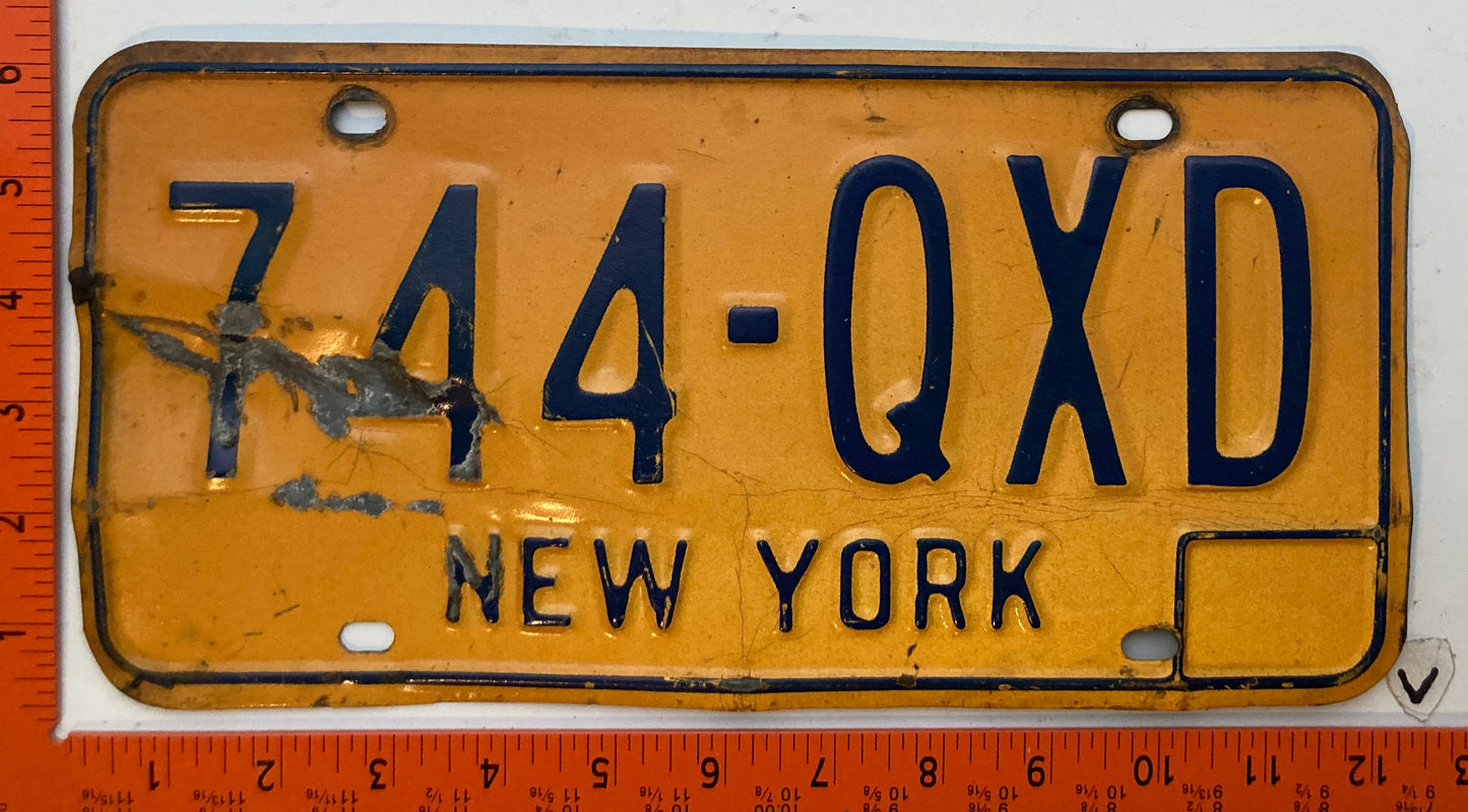 1973 base New York #774-QXD Passenger License Plate