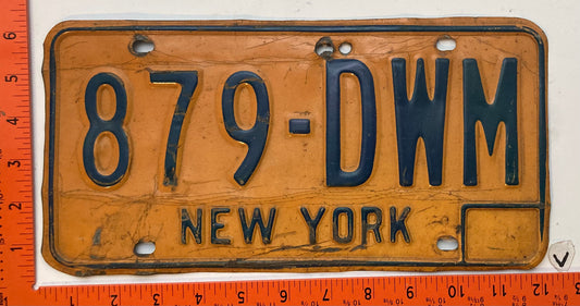 1973 base New York #879-DWM Passenger License Plate