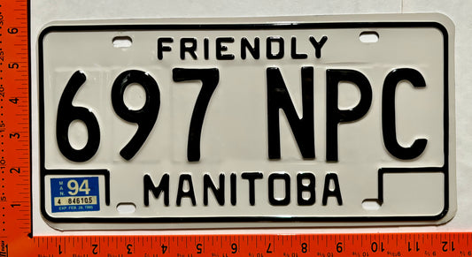 1994 Manitoba #697 NPC Passenger License Plate