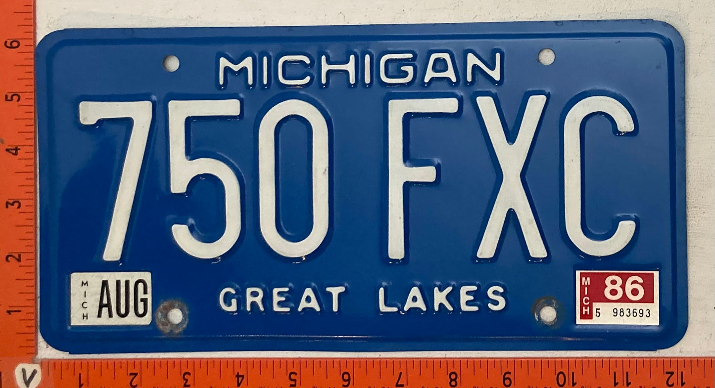 1986 Michigan #750 FXC Passenger License Plate