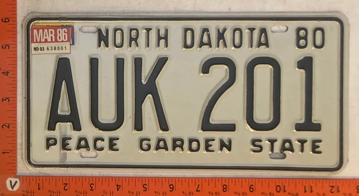 1986 North Dakota #AUK 201 Passenger License Plate