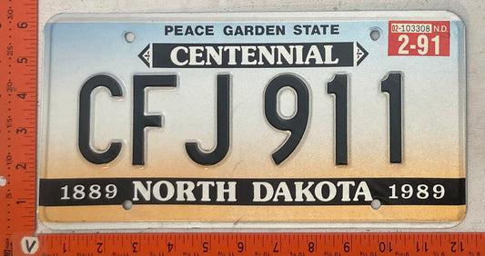 1991 North Dakota #CFJ 911 Passenger License Plate