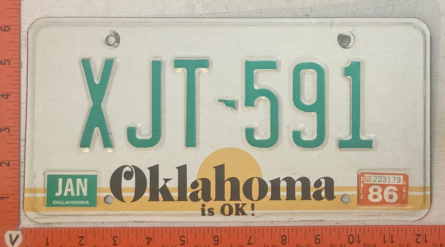 1986 Oklahoma #XJT-591 Passenger License Plate