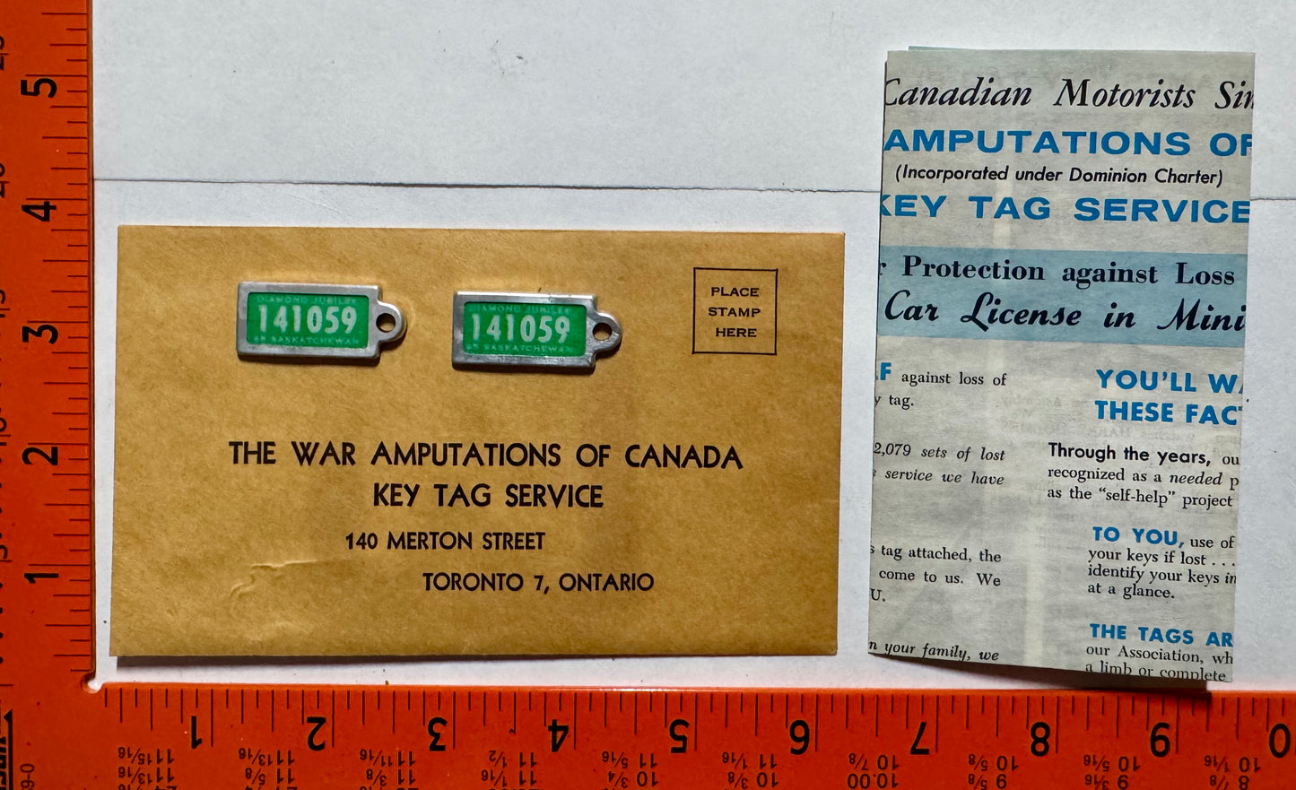 1965 Saskatchewan #141-059 Passenger License Plate Pair w/keychain tags