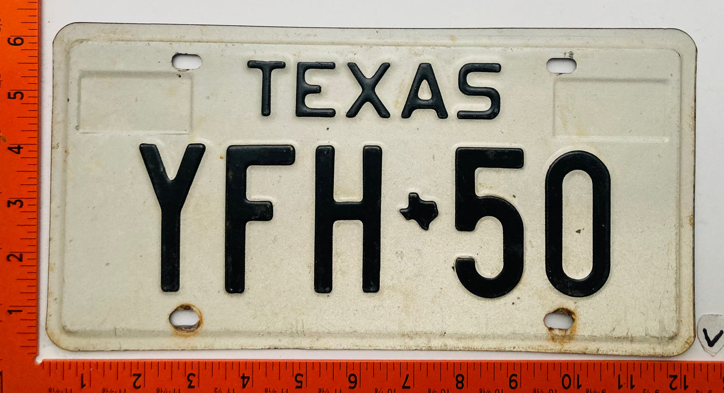 1975 Texas #YFH 50 Passenger License Plate
