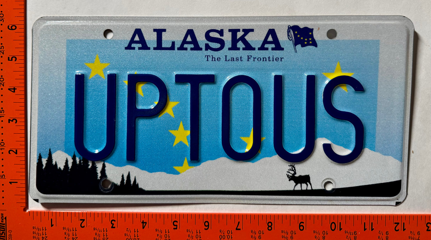 undated Alaska #UPTOUS Passenger Vanity License Plate