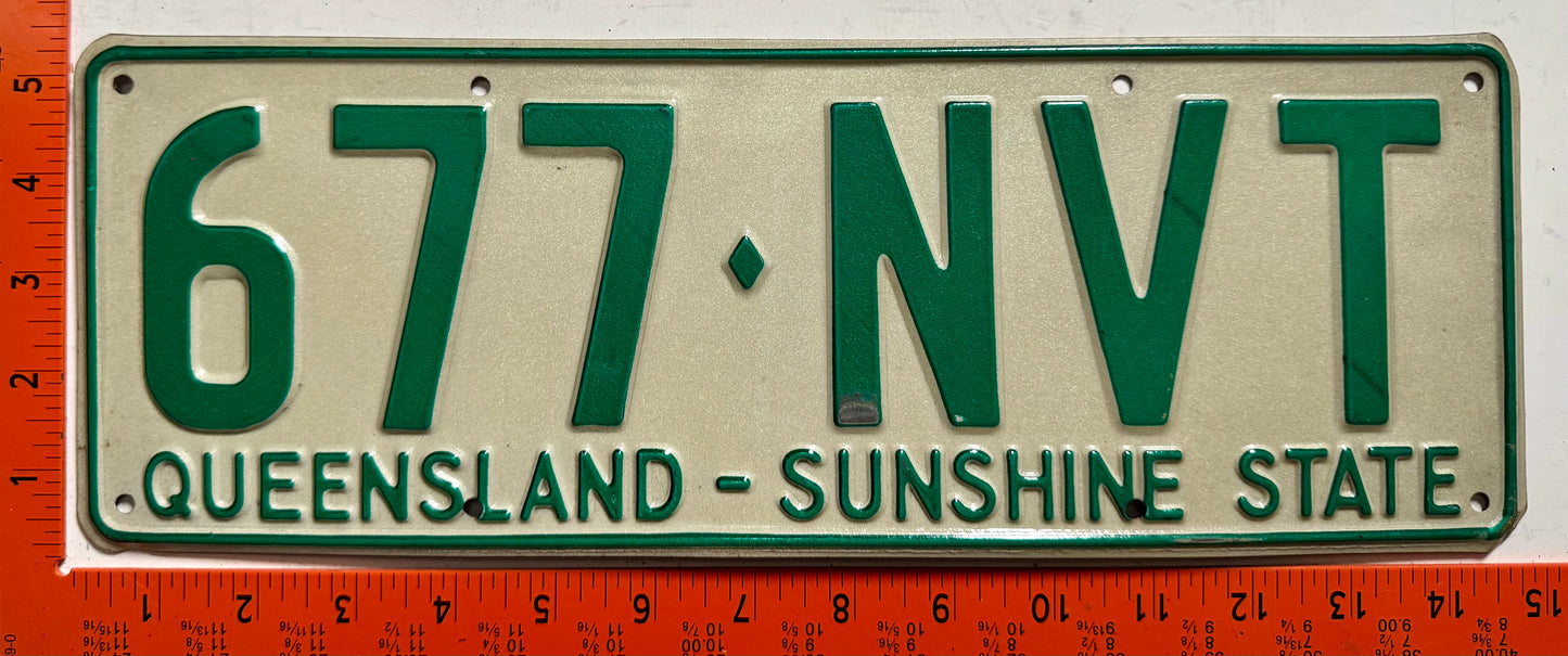 1977 base Queensland, Australia #677-NVT Passenger License Plate