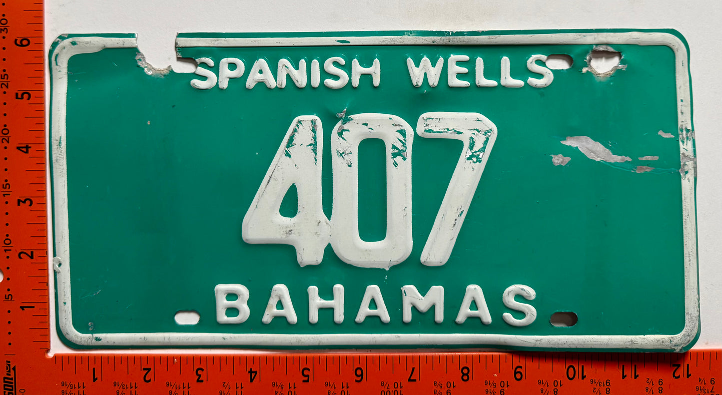 1990 base Spanish Wells, Bahamas #407 Passenger License Plate