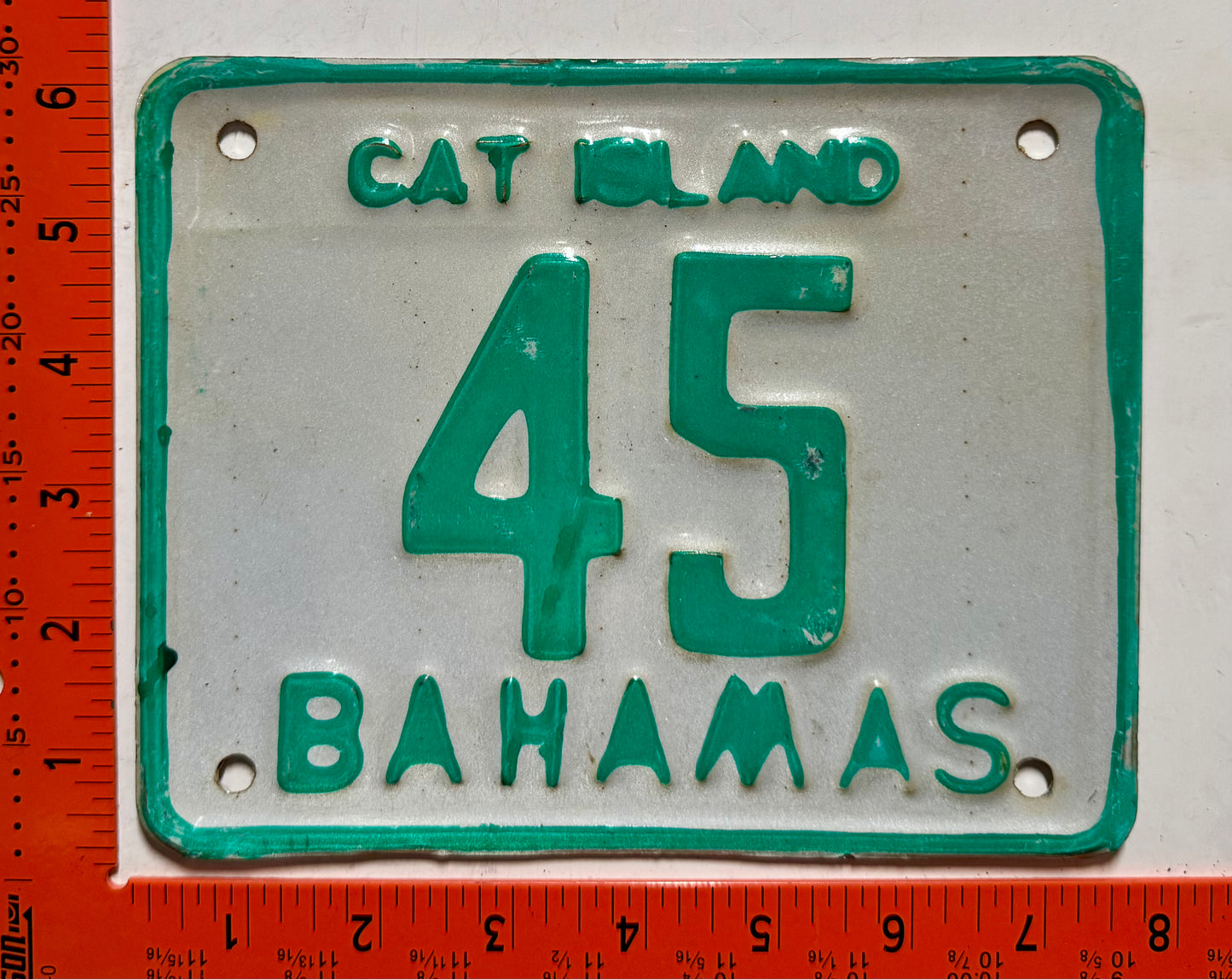 1983 base Cat Island, Bahamas #45 Motorcycle License Plate