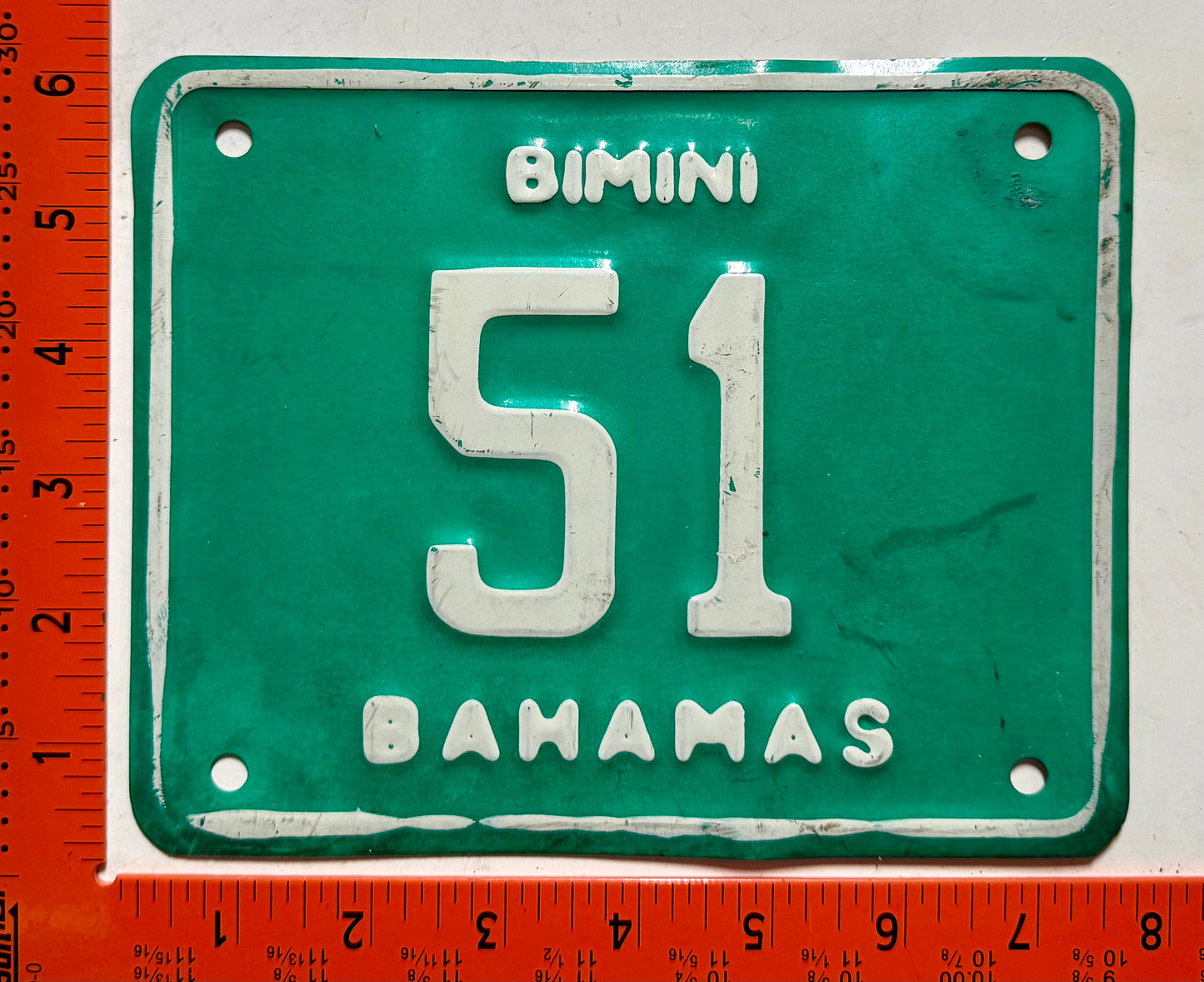 1990 base Bimini, Bahamas #51 Motorcycle License Plate