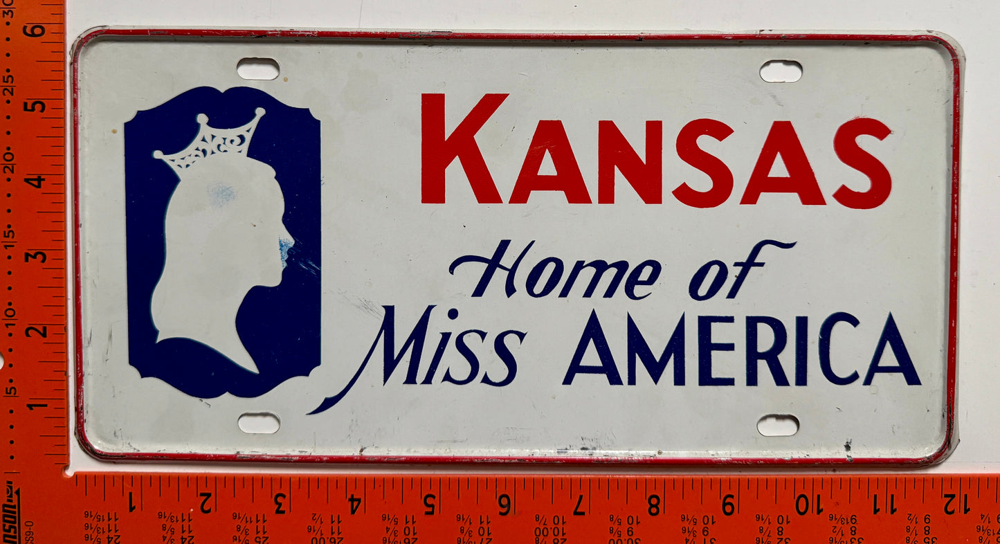 Undated Kansas Home of Miss America Booster License Plate