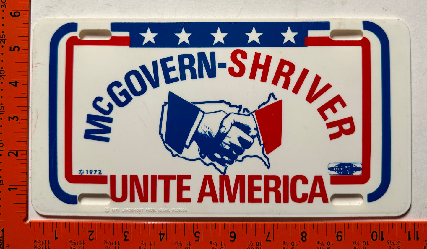 1972 McGovern-Shriver Unite America Booster License Plate