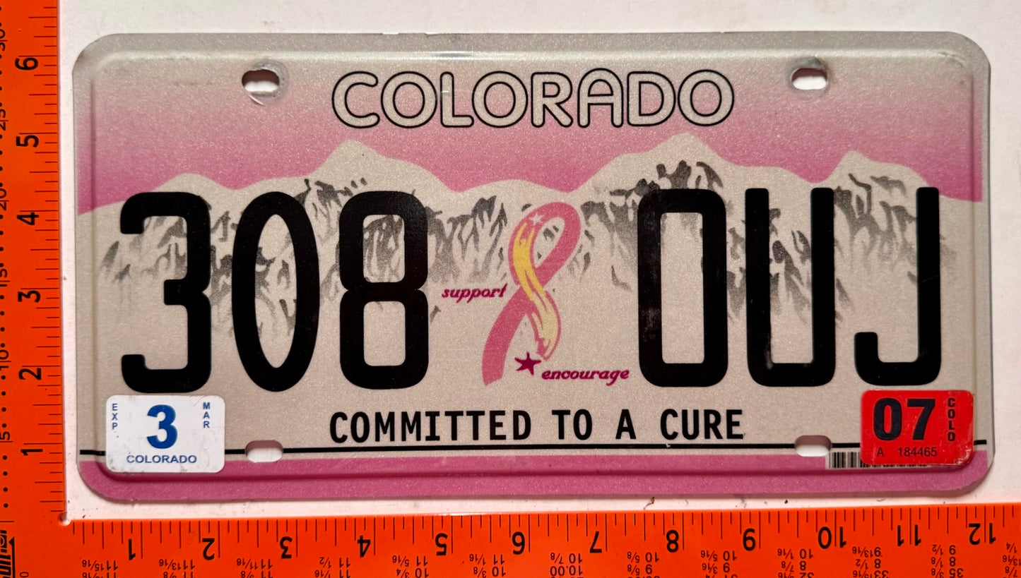 2007 Colorado #308 OUJ Cure Breast Cancer License Plate