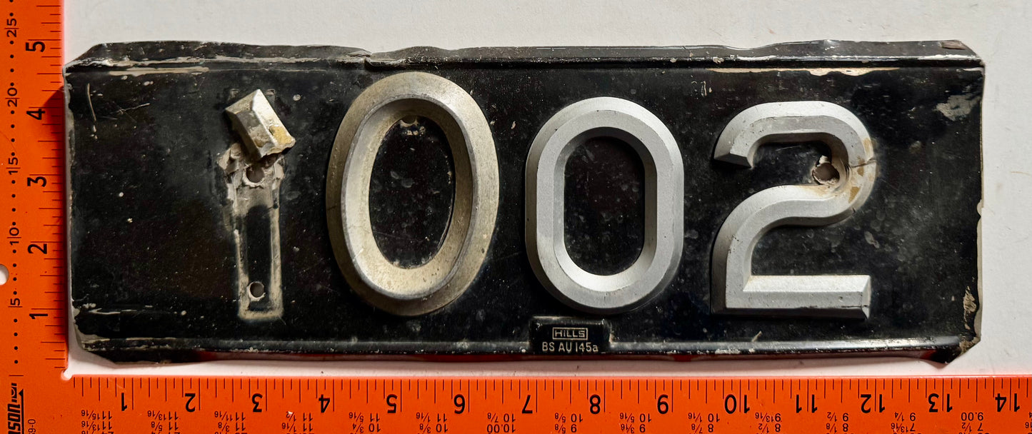 undated Grenada (Carriacou Island) #1002 Passenger License Plate