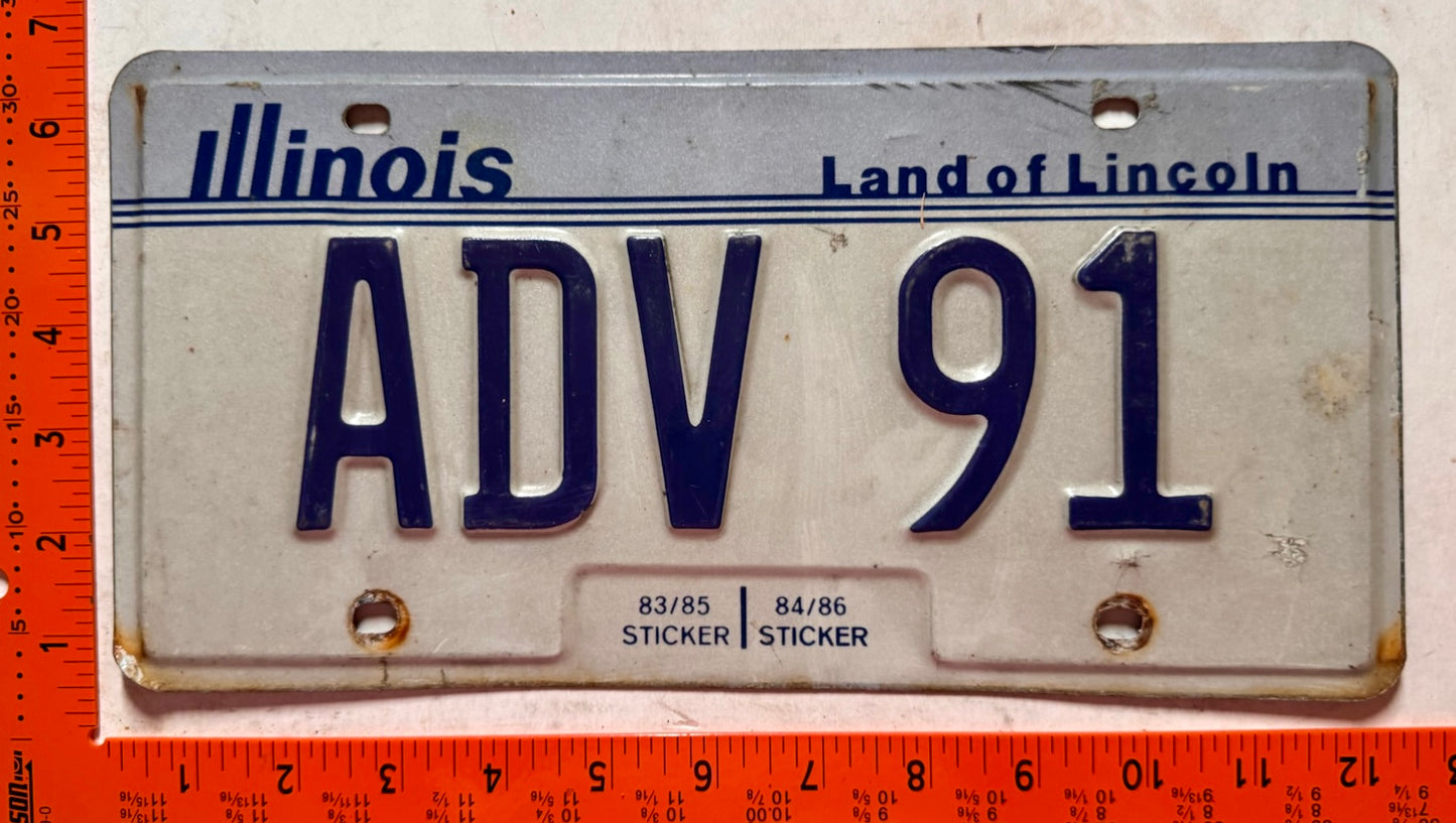 undated Illinois #ADV 91 Passenger Vanity License Plate