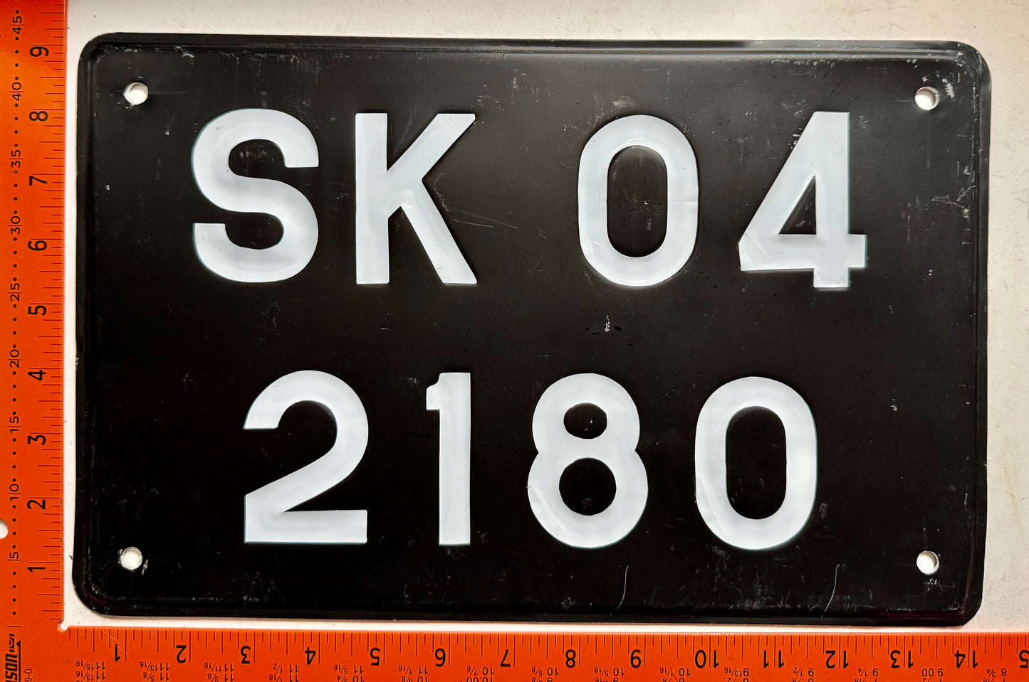 undated India #SK 04/2180 Passenger License Plate