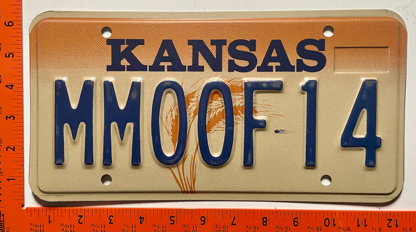 undated Kansas #MMOOF14 Passenger Vanity License Plate