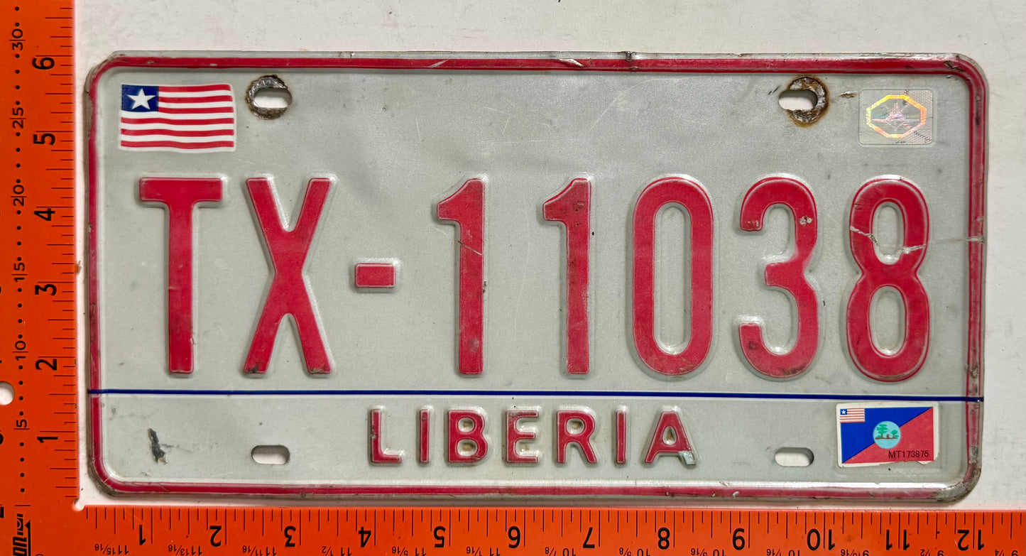 2010 base Liberia #TX-11038 Taxi License Plate