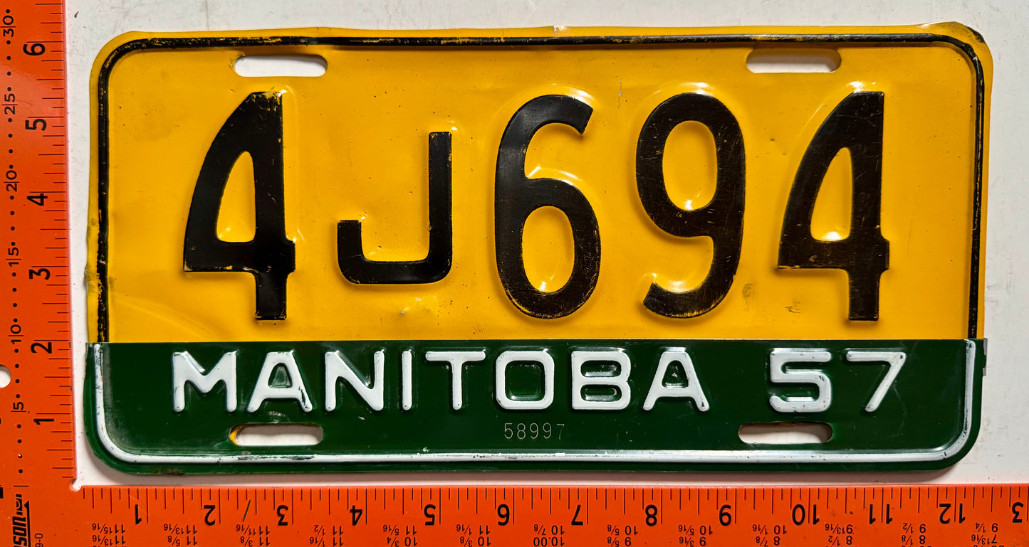 1957 Manitoba #4J694 Passenger License Plate