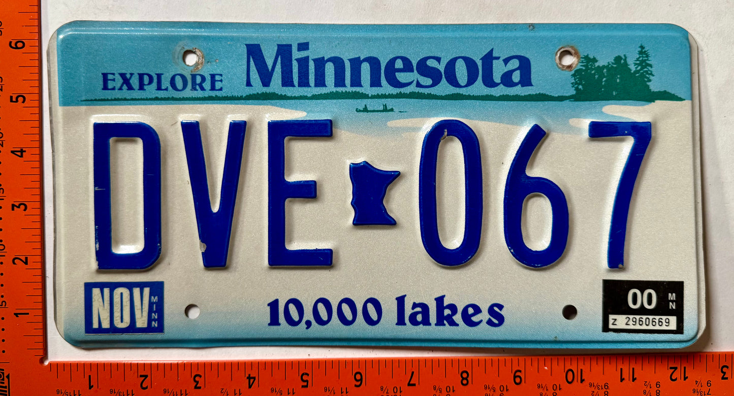 2000 Minnesota #DVE 067 Passenger License Plate
