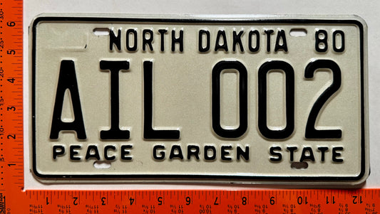 1980 North Dakota #AIL 002 Passenger License Plate
