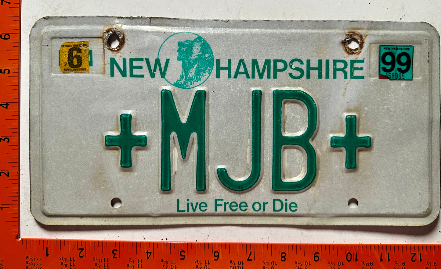 1999 New Hampshire #+MJB+ Passenger Vanity License Plate