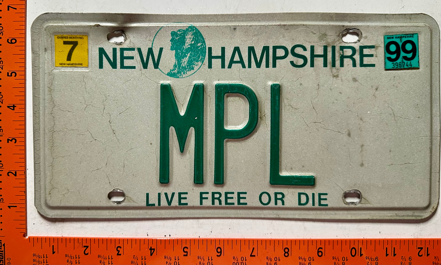 1999 New Hampshire #MPL Passenger Vanity License Plate