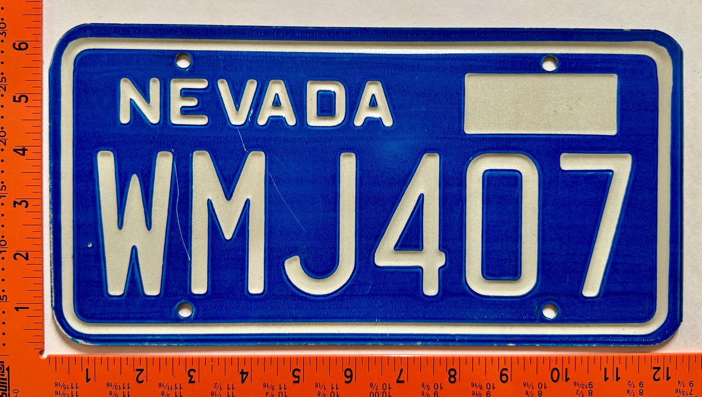 1976 base Nevada #WMJ407 Passenger License Plate