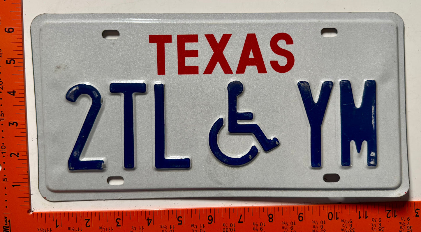 undated Texas #2TL YM Handicapped License Plate