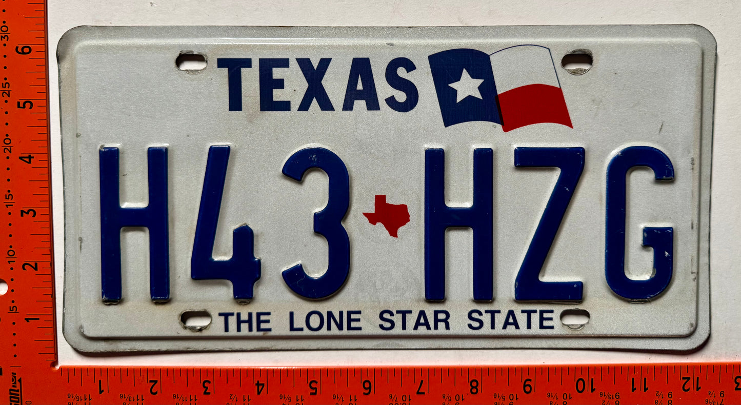 undated Texas #H43 HZG Passenger License Plate