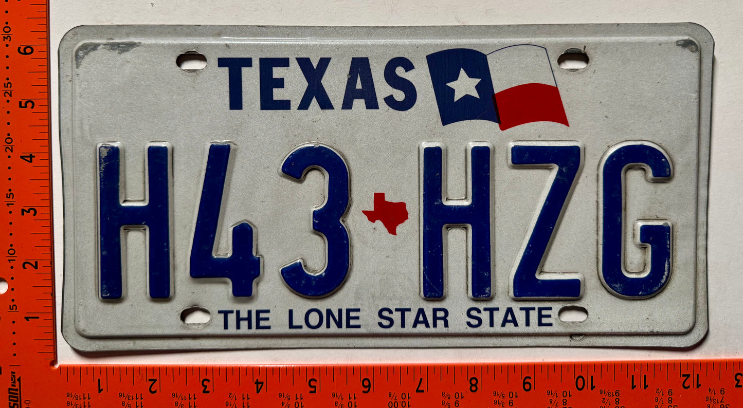 undated Texas #H43 HZG Passenger License Plate