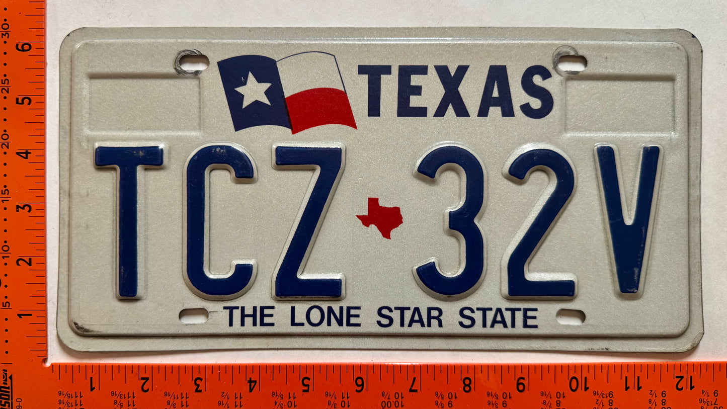 undated Texas #TCZ 32V Passenger License Plate