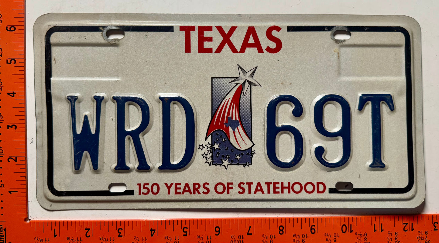 undated Texas #WRD 69T Passenger License Plate