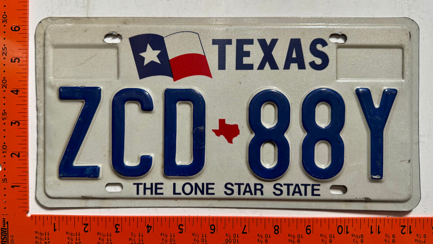 undated Texas #ZCD-88Y Passenger License Plate