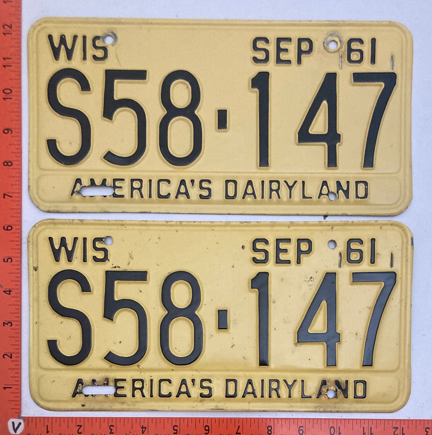 1961 Wisconsin #S58-147 Passenger License Plate PAIR