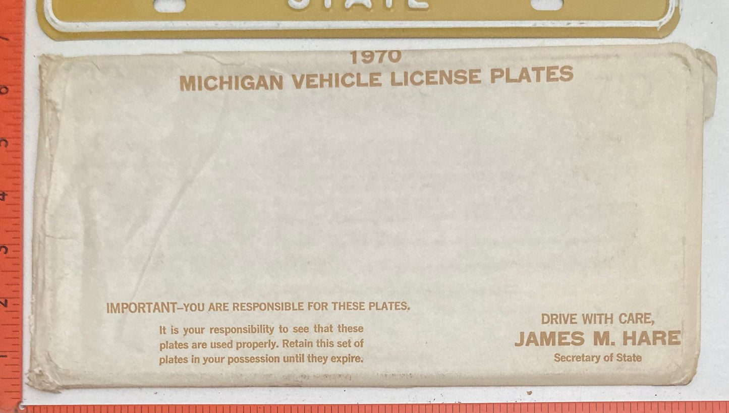 1970 Michigan #251D83 DEALER License Plate with original envelope