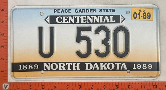 1989 North Dakota #U 530 Used Car Dealer License Plate