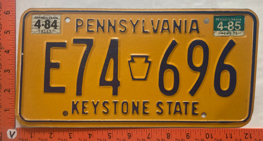 1985 Pennsylvania #E74 696 Passenger License Plate
