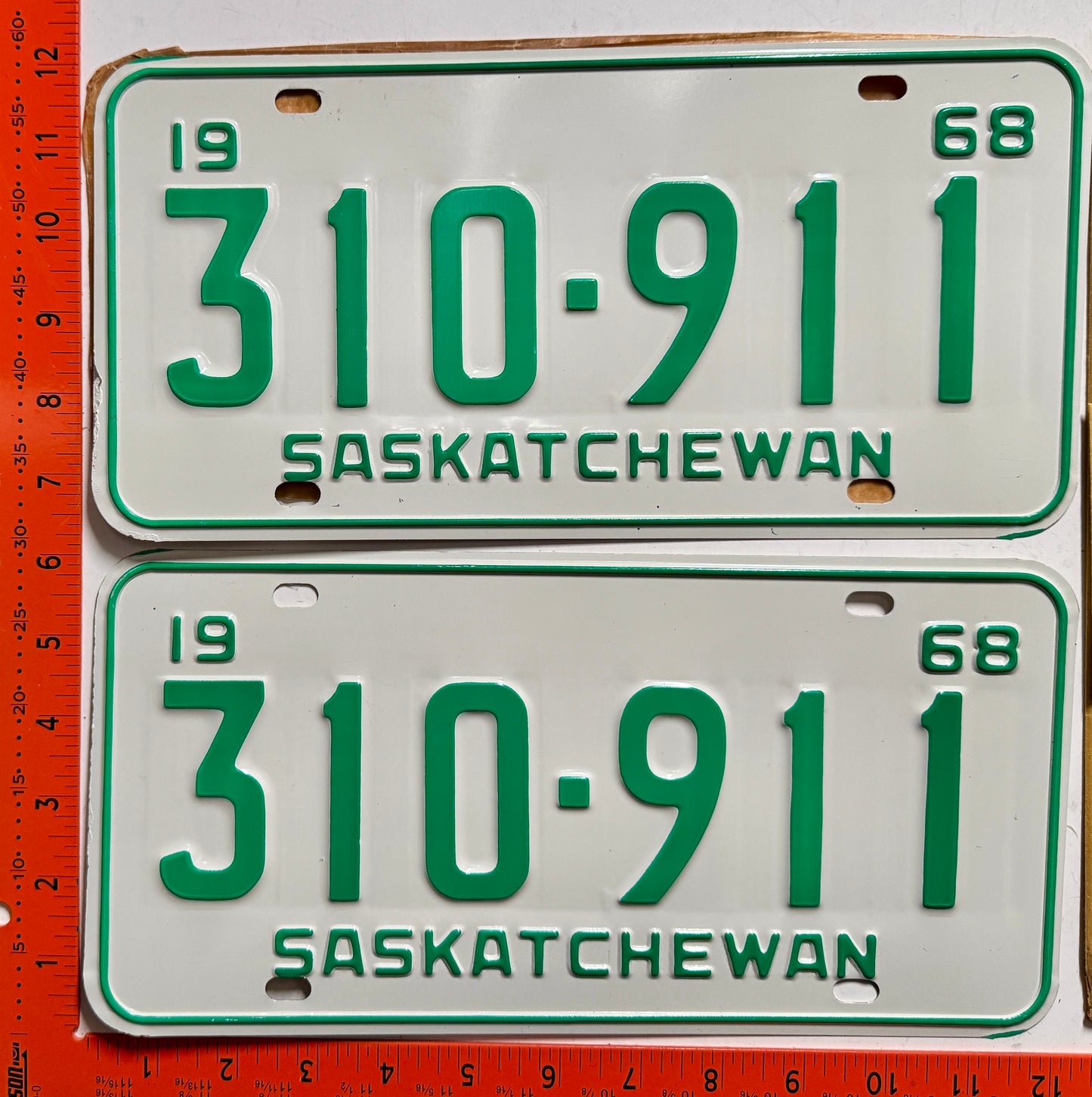 1968 Saskatchewan #310-911 Passenger License Plate Pair w/keychain tags