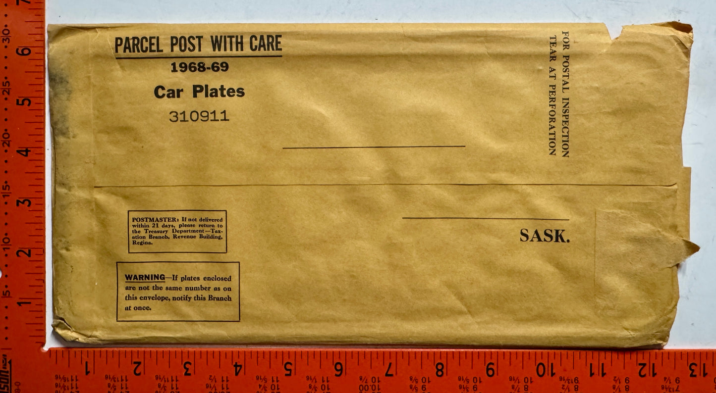 1968 Saskatchewan #310-911 Passenger License Plate Pair w/keychain tags