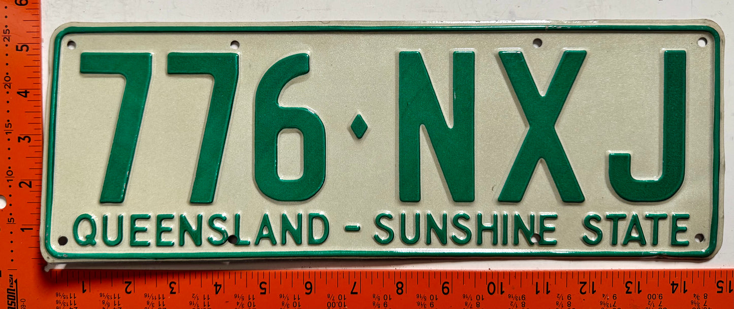 1977 base Queensland, Australia #776-NXJ Passenger License Plate