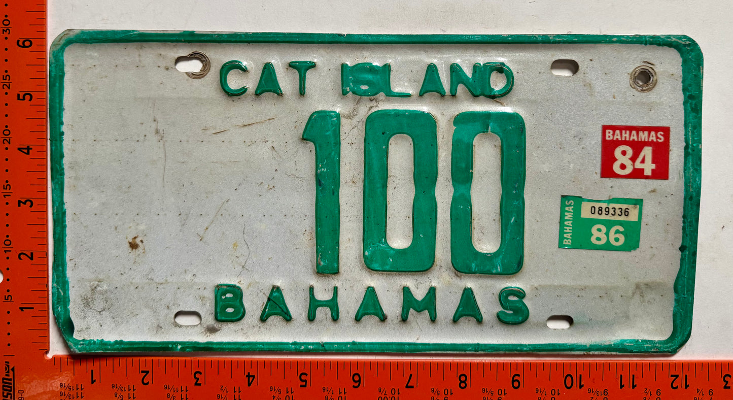 1984/1986 Cat Island, Bahamas #100 Passenger License Plate