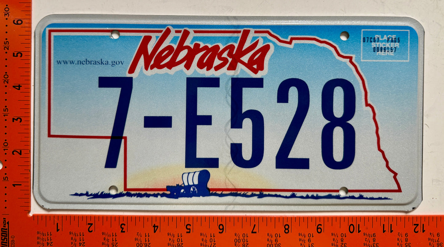2005 base Nebraska #7-E528 Passenger License Plate