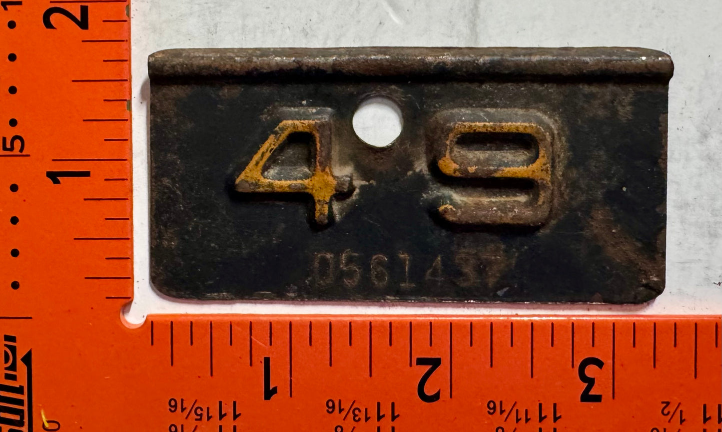 1949 New York #0561437 Passenger License Plate Date Tab