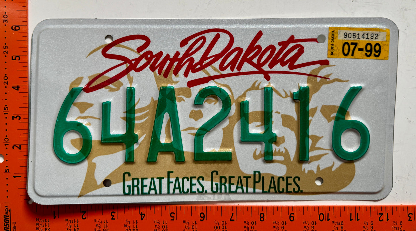 1999 South Dakota #64A2416 Passenger License Plate